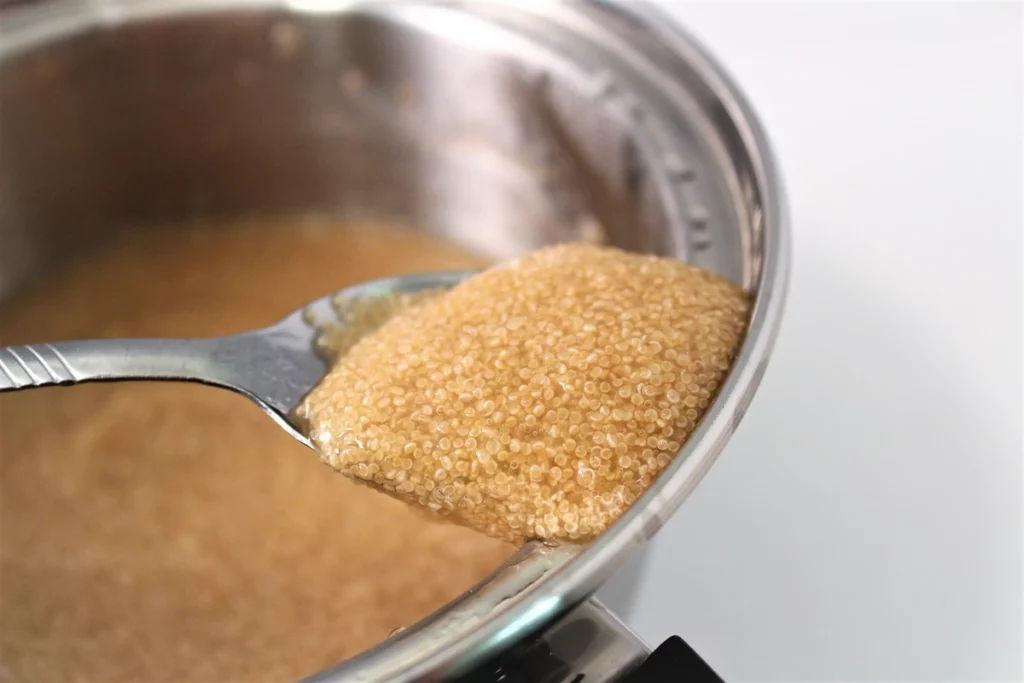 closeup of cooked amaranth on a spoon